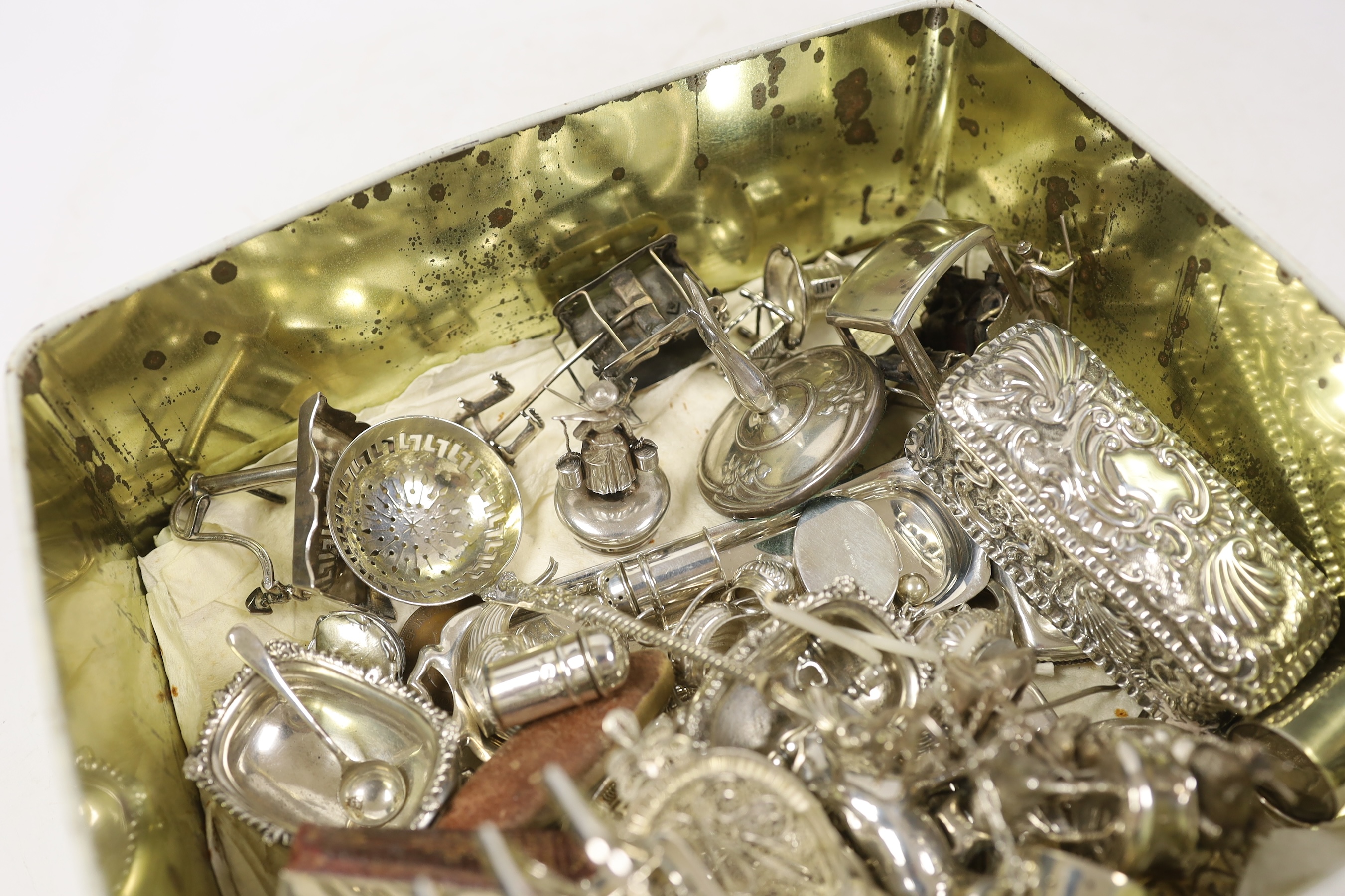 Sundry small silver and white metal items including miniature tea set and tray, a mounted bible, a trinket box, vesta cases, condiments, a Victorian sifter spoon, a filigree chair, miniature items including 925 candelabr